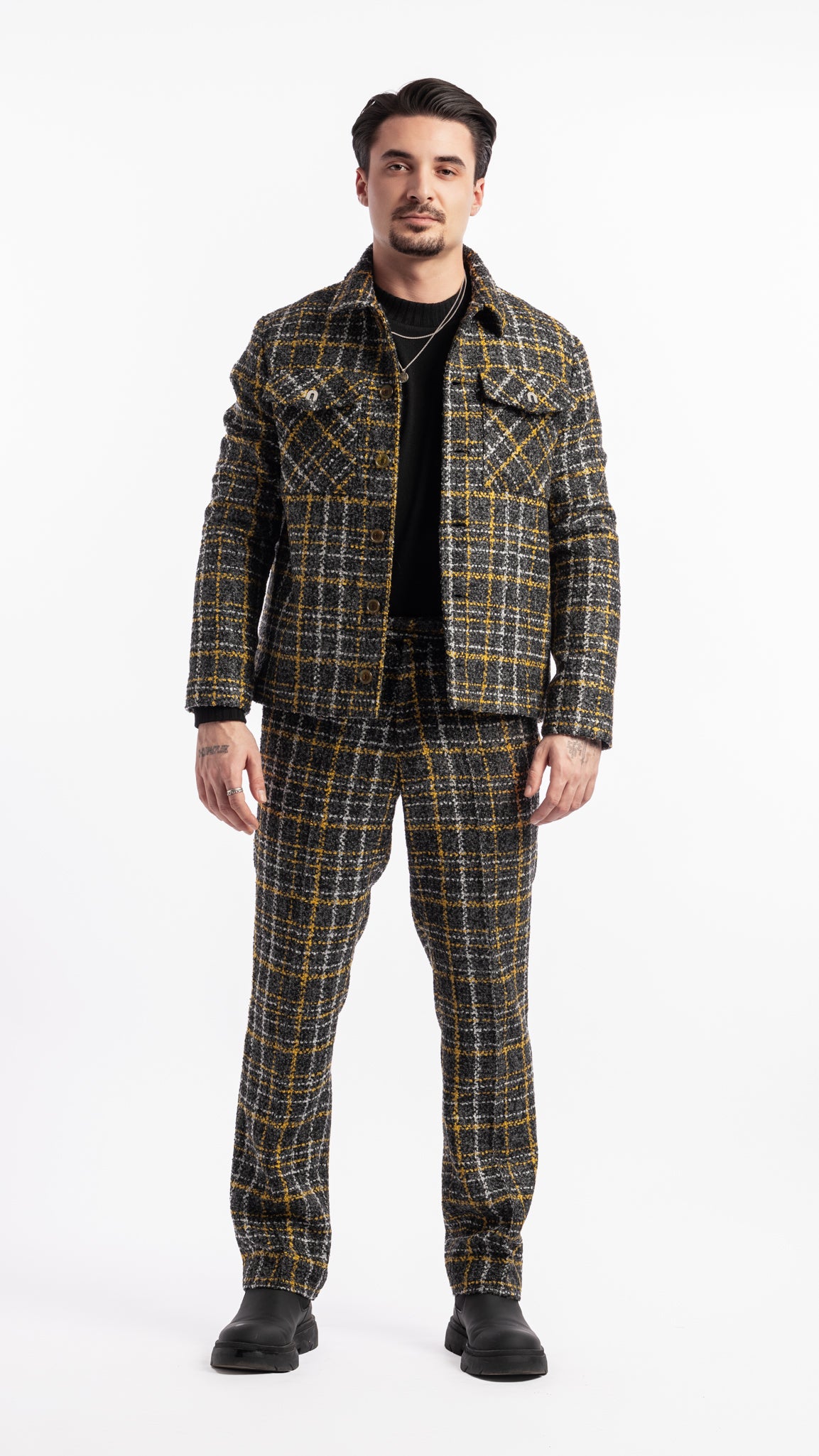 Pantalon noir et jaune en tissu bouclé Unik Paris coupe droite