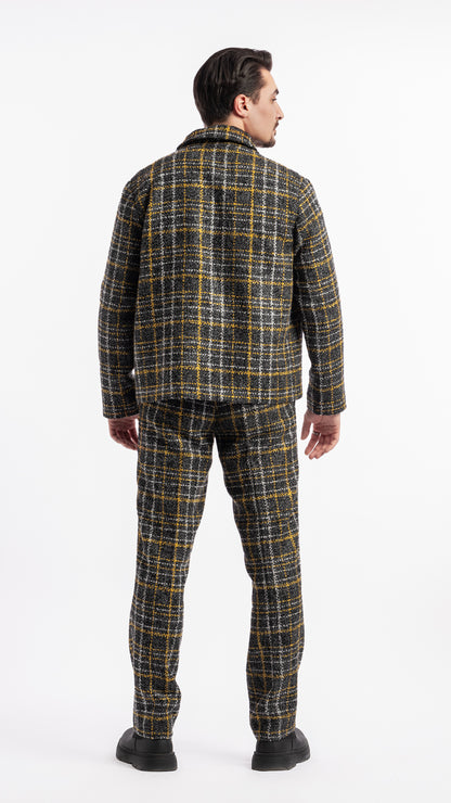 Pantalon noir et jaune en tissu bouclé Unik Paris coupe droite