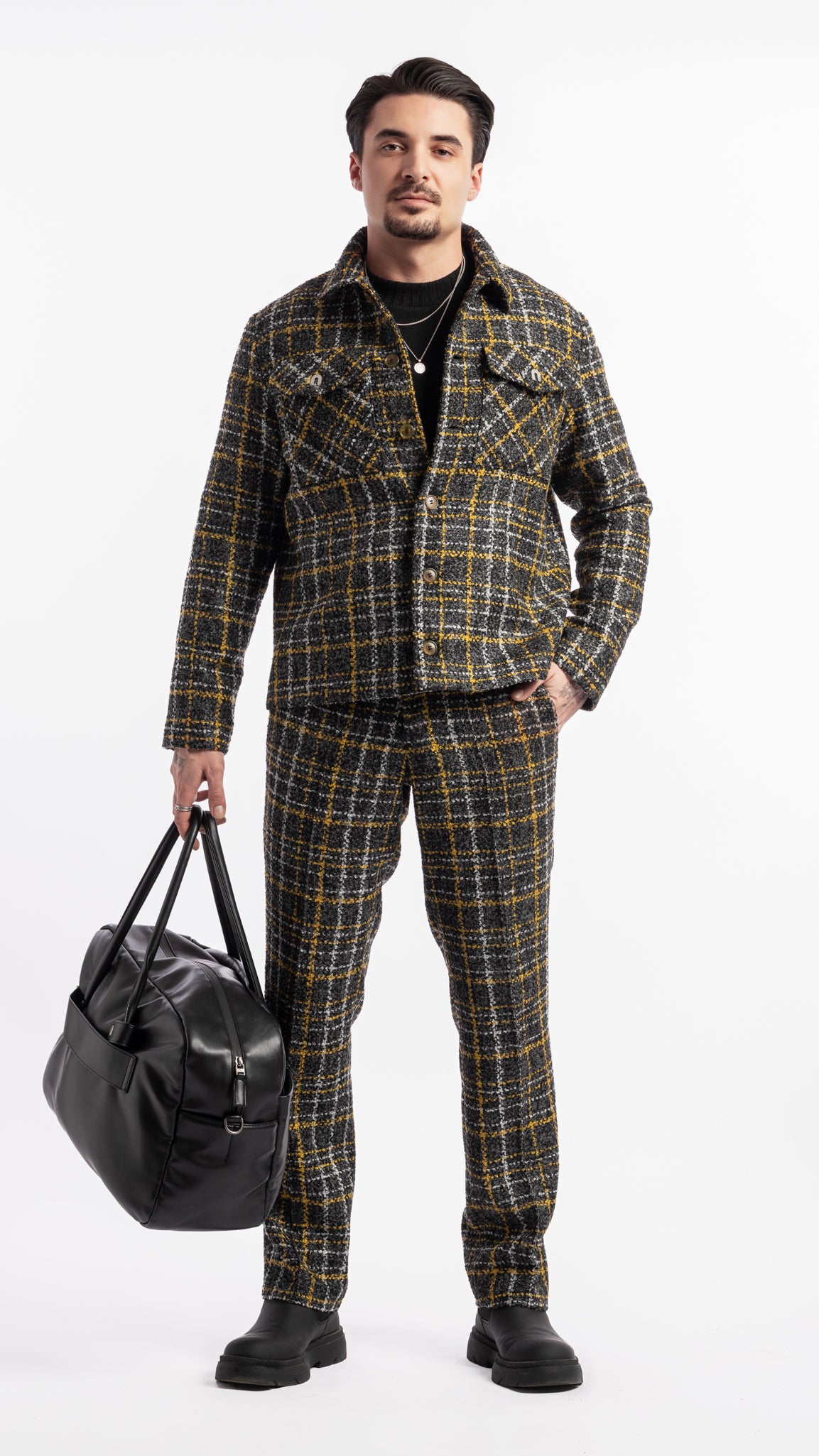Pantalon noir et jaune en tissu bouclé Unik Paris coupe droite