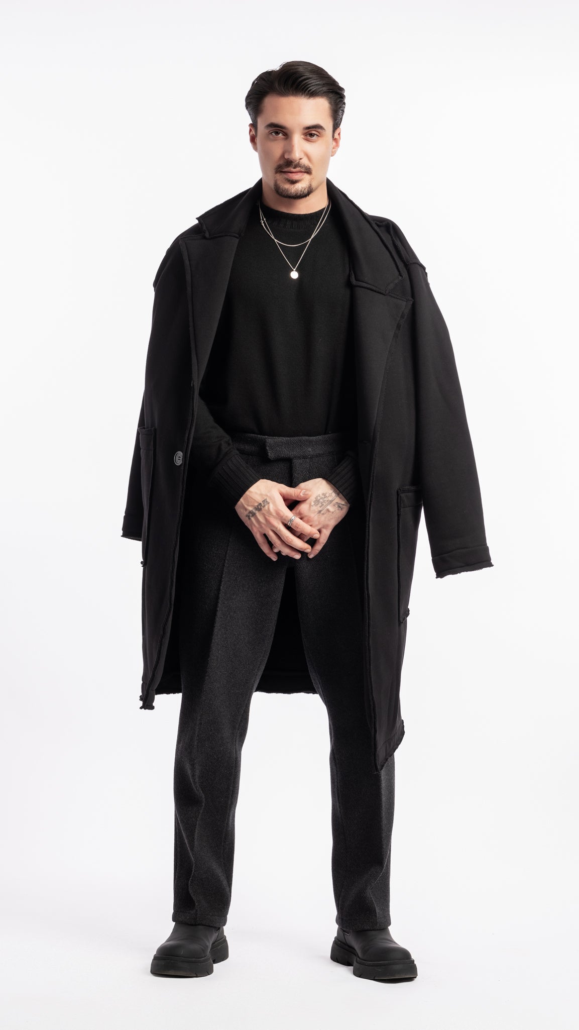 Manteau noir Unik Paris en coton avec logo brodé