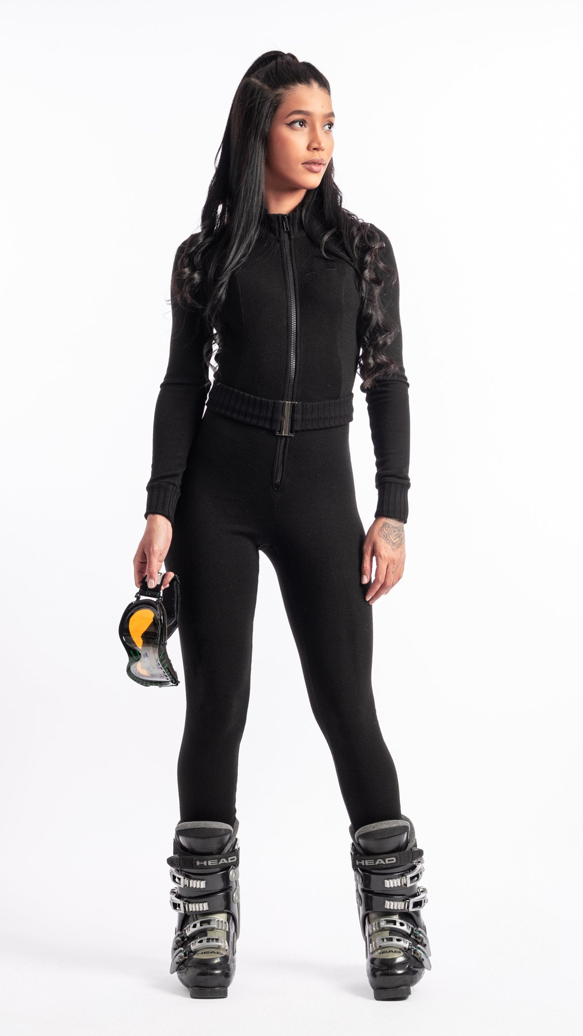 Combinaison noire en maille pour ski avec zip et ceinture Unik Paris
